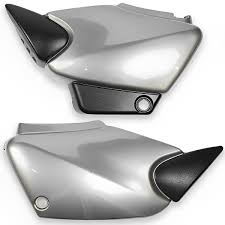 TAMPA LATERAL TITAN 00-01 (CINZA TORNADO METALICO)